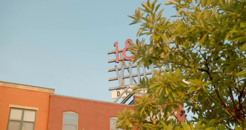 Kansas City, Missouri / USA - June 13, 2019: 18th & Vine District Sign, Kansas City Buildings, Skyline