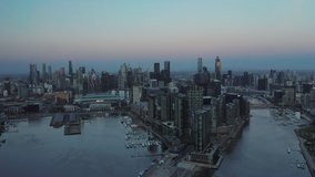 An aerial sunset video of Melbourne CBD at Dockland, Melbourne, Australia