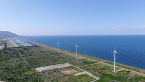 Aerial video.Wind-power generation and Oil tank 