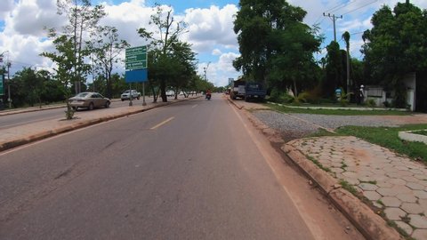 Siem Reap / Cambodia - 08 28 2019: Hyperlapse of Heading out of of Town Towards Siem Reap International Airport