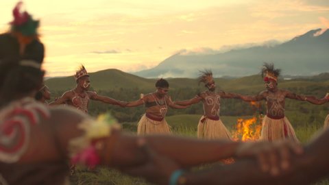Sentani , Papua / Indonesia - 08 19 2018: Indigenous Papua bonfire dance