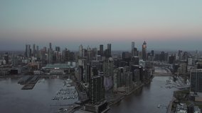 An aerial sunset video of Melbourne CBD at Dockland, Melbourne, Australia