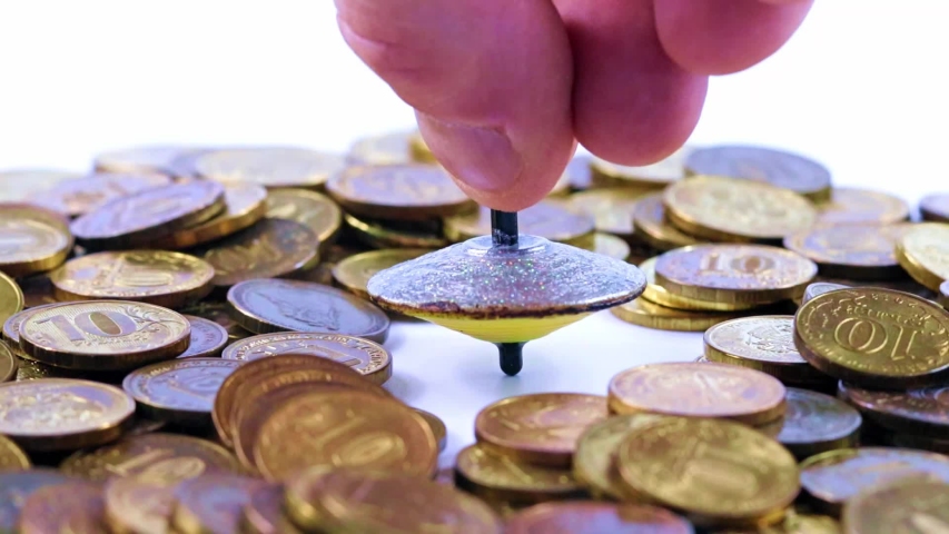 plastic spinning top and metal coins
