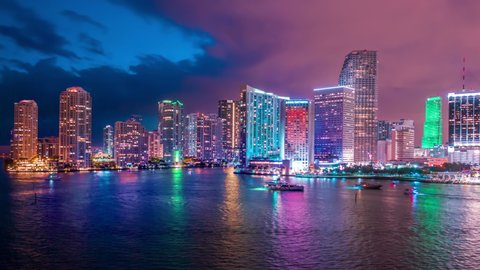 Amazing Miami downtown timelapse hyperlapse. Beautiful aerial shot of Miami city. Best Miami Aerial shot and top view of Miami downtown skyline. Drone flying over a city night lights in 4K วิดีโอสต็อก