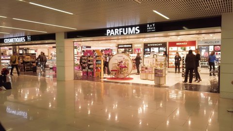 ORLY / France - 05 08 2019: Orly Airport. PARIS - MAY 08, 2019: Paris Orly Airport interior views with passengers, duty free shops ans waiting areas