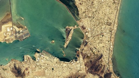 Harbour satellite aerial view sunrise night to day animation of Aden Yemen. Contains public domain image by Nasa