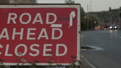 Dewsbury , West Yorkshire / United Kingdom (UK) - 09 01 2019: Road ahead closed red sign warning motorists of road works ahead