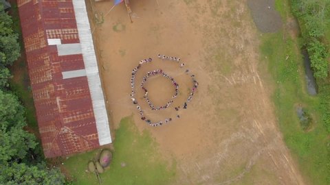 Tamei , Manipur / India - 07 23 2019: Students spreading out from the circle in a School ground