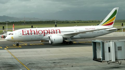 CAPE TOWN, SOUTH AFRICA, CIRCA SEPTEMBER 2019, Ethiopian Airways dreamliner taxiing plane side view, turns & approaches parking point at gate Cape Town airport from Addis Ababa.