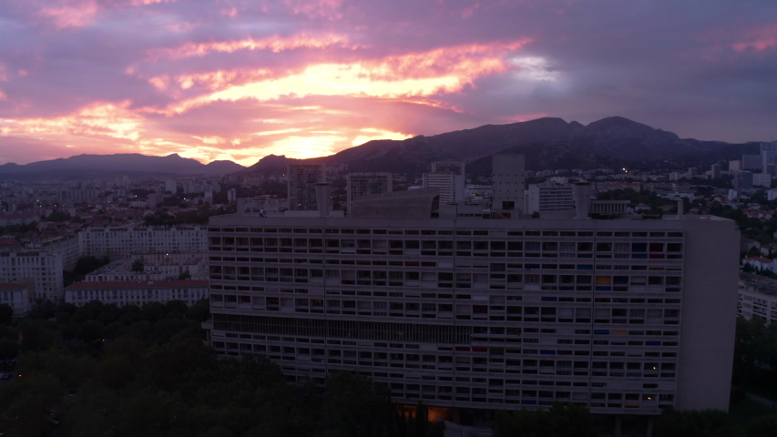 Aerial shot over"Le Corbusier" in Marseille city during the sunrise.
The city of Marseille in the south of France is waking up early morning.
Cité radieuse of Marseille