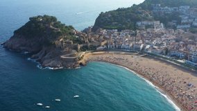 Spanish sea resorts. Aerial view to Muralla de Tossa de Mar. Costa Brava Coast. Catalonia. Spain.  Aerial 4k video footage