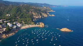Sea beach boats of Tossa de Mar. Costa Brava Coast. Catalonia. Spain.  Aerial 4k video footage