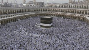 Muslim pilgrims from all over the world gathered to perform Umrah or Hajj at the Haram Mosque in Mecca. Mecca Kaaba Hajj Muslims performing Tawaf Stock Video Footage