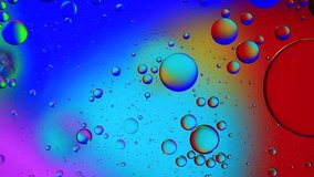 Colorful artistic image of oil drop floating on the water 