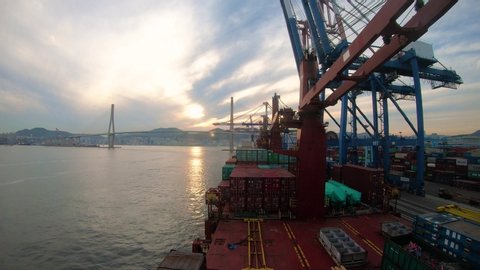 Time lapse of vessel departing Busan during sunset,South Korea