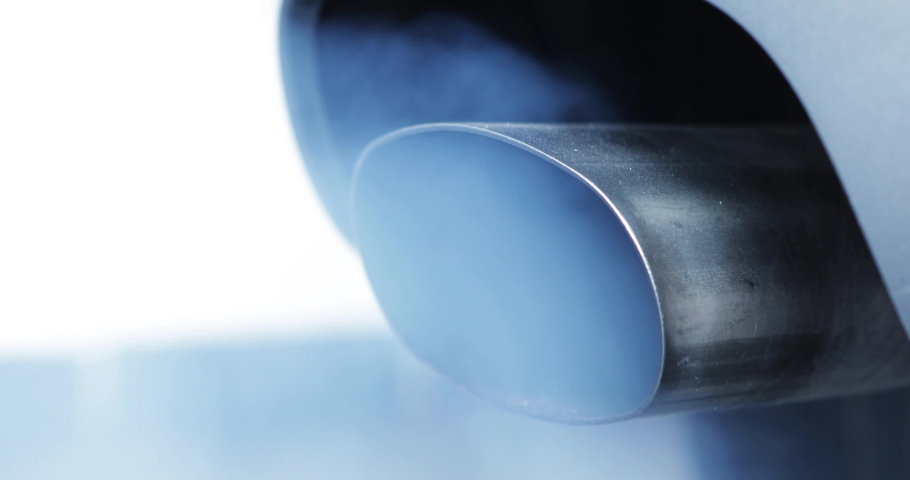 Air pollution smoke from car exhaust pipe. Shot in 4k resolution | Shutterstock HD Video #1037559245