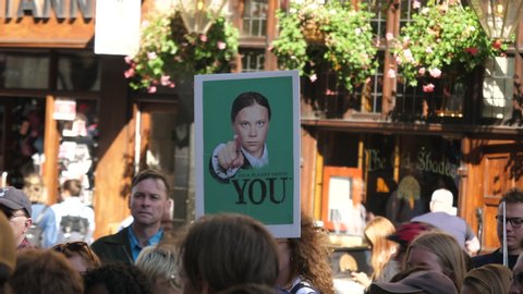 LONDON, UK - 20 SEP 2019; Protester holds Banner Placard of Greta Thunberg planet needs you