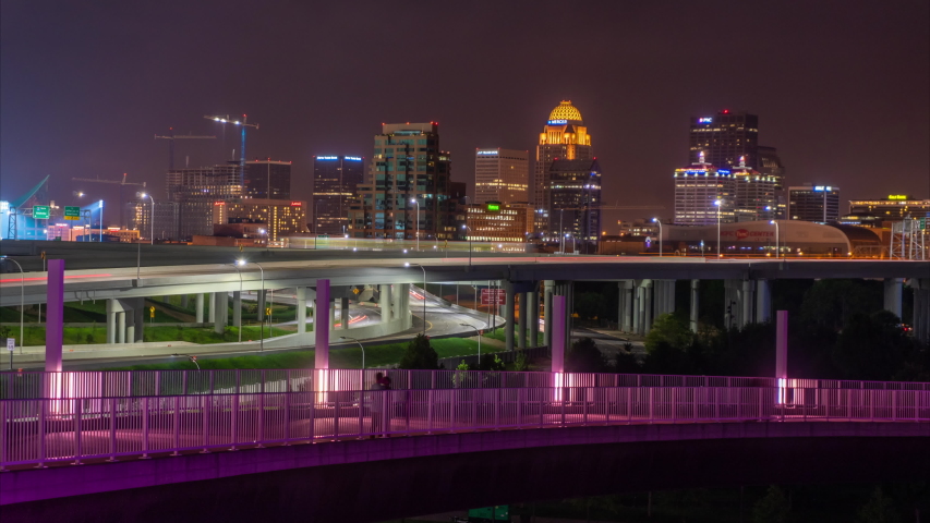 Timelapse of downtown Louisville KY at night with passing cars