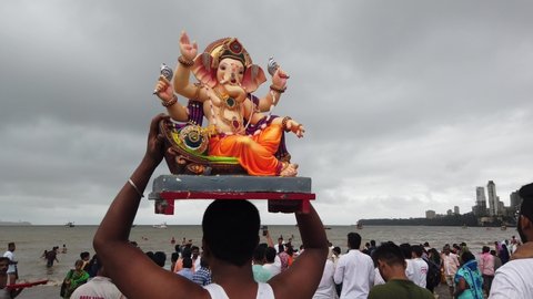 Mumbai-India, September 12th 2019,People celebrating Ganesha immersion festival called as Visarjan near Girgaum Chowpatty in bombay,indian god ganpati