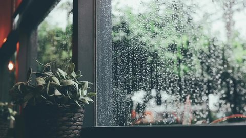 Rain drop on window, rainy day.
