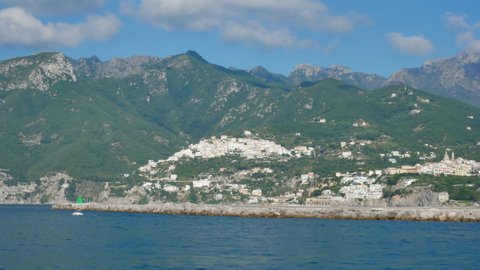View on Amalfi coast and Vietri sul Mare from the moving ferry on summer. Italy on August 16, 2019.