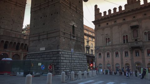BOLOGNA, ITALY - circa 2019: Square Piazza di Porta Ravegnana in Bologna and two Tower Torri Garisenda and Torri Asinelli,environmental sound