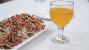 fried rice with glass of juice served on the food table stock video footage
