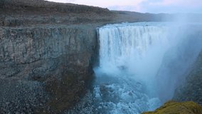 Fantastic summer scene of most powerful waterfall in Europe - Dettifoss. Jokulsargljufur National Park, Iceland. White nights view. Full HD video (High Definition).