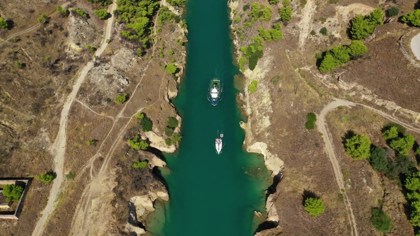 Aerial video taken by drone of Corinth Canal of Isthmos or Isthmus connecting mainland with Peloponnese, Greece