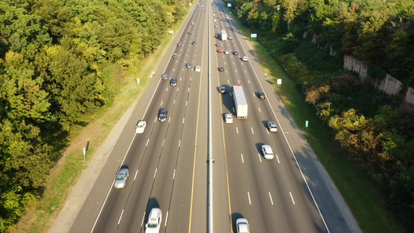 Aerial view of I80 highway in New Jersey with vertical up tilt effect on a sunny afternoon.