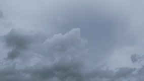 Dramatic clouds sky  before thunder storm TimeLapse. Abstract nature background of beautiful white & dark rain cloudscape moving by wind in rainy season in tropical summer sky, overcast weather, space
