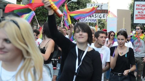 Podgorica, Montenegro: 21 September 2019: LGBTQI pride parade. March in protest. Colourful parade celebrating LGBTIQ rights. Protesters walking with banners and flags. Human rights.