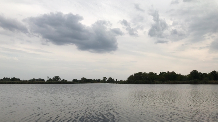 clouds above the river time lapse