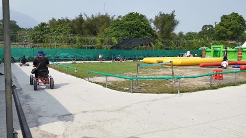 Hong Kong , New Territories / China - 04 05 2019: Parent-child children's playground, Blowing game and riding car, entertainment gatherings, outdoor activity in Hong Kong, 5 April 2019