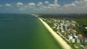 Aerial video Barefoot Beach approaching Bonita Naples FL