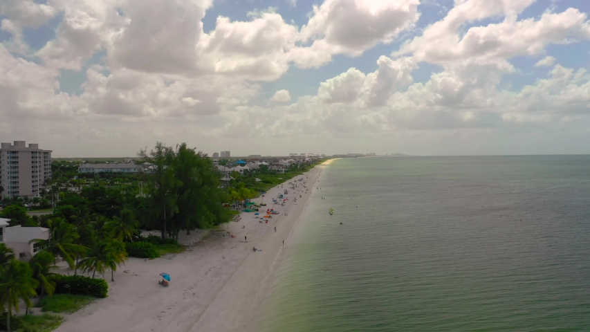 People visiting Bonita Beach Florida 4k