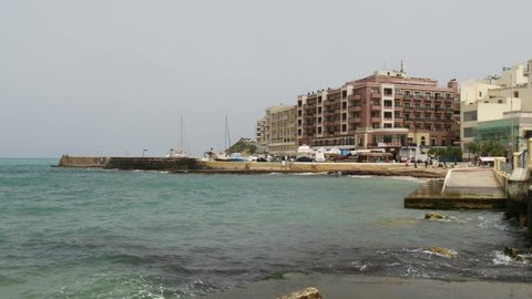 Marsalforn / Malta - 04 24 2019: Waves Crashing On The Port Of Marsalforn, Gozo