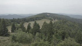 aerial view over mountains in Velke karlovice beskydy czech, This clip is available in two different gradings , 10bit color or dji color lut 