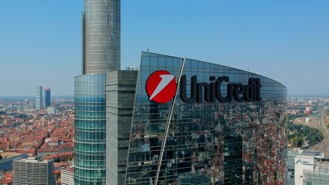 Milan Italy September 25, 2019: The modern tower is unicredit in European Milan. The inscription on the building. Modern business center in the Italian fashion city. New city architecture