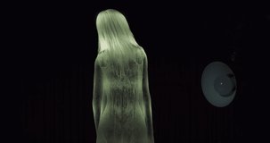 A Ghost in a Dark Room. Realistic Spiritual Animation with Camera Shake Effect with an Abstract Female Spirit Figure.