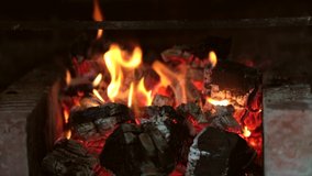 Burning Fire In The Fireplace. A looping clip of a fireplace with medium size flames