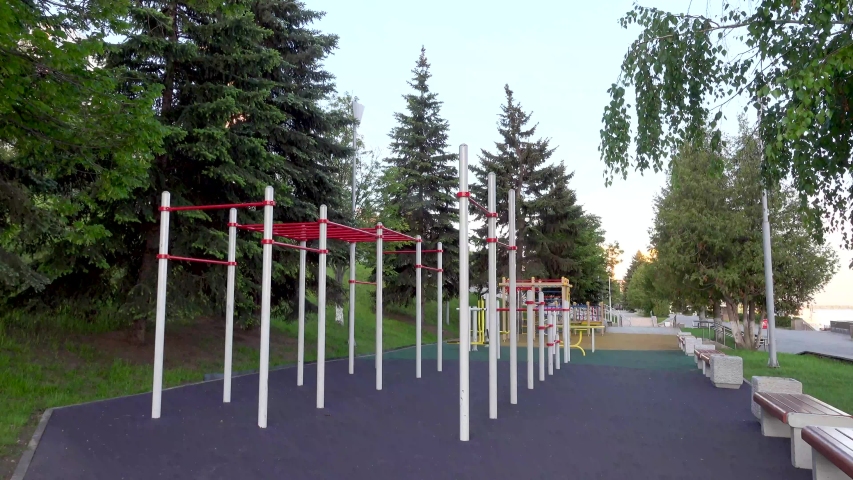 eautiful river embankment with a sports field