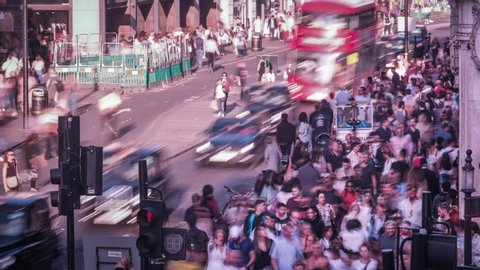 LONDON- SEPTEMBER, 2019: Time lapse of crowds of people and traffic on Oxford Street, a famous shopping destination