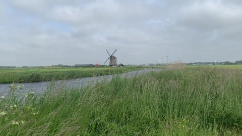 Dutch windmill blowing in the wind