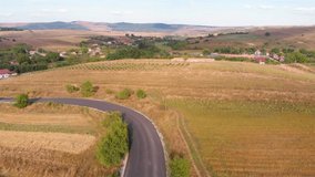 Curvy Road with small village and landscape Aerial
Drone footage over Curvy Road with small village and landscape
