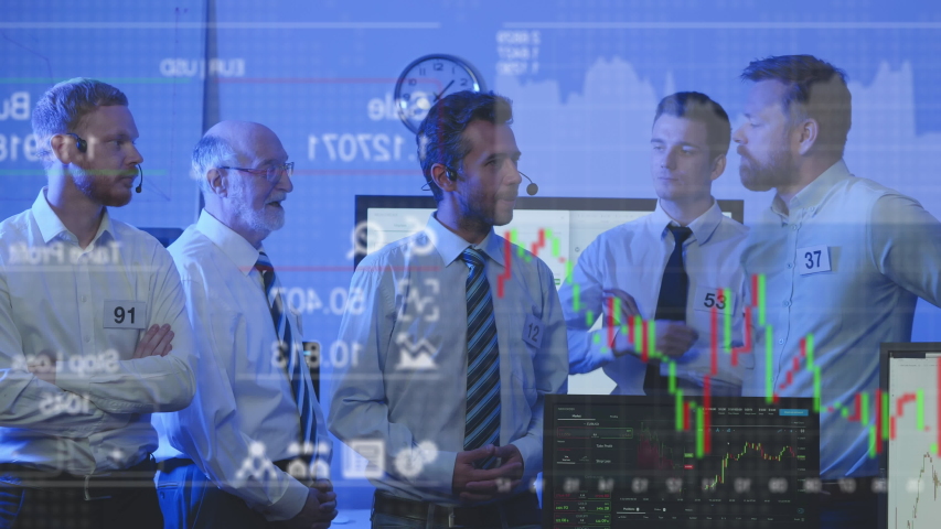 Group of Stock Market Brokers Looking At Graphs On Screen In Office Waiting for Shares Climbed | Shutterstock HD Video #1037842115