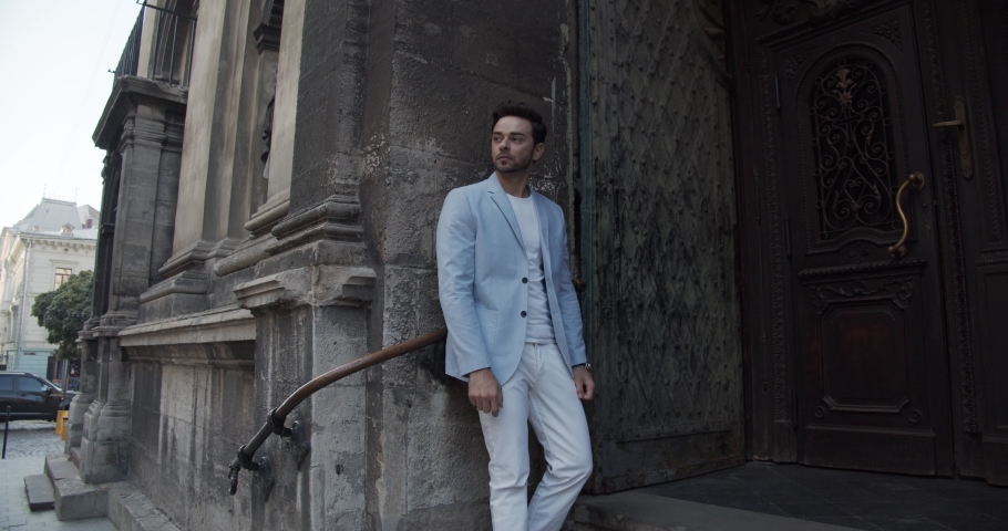 Modern man looks at the clock | Shutterstock HD Video #1037875724