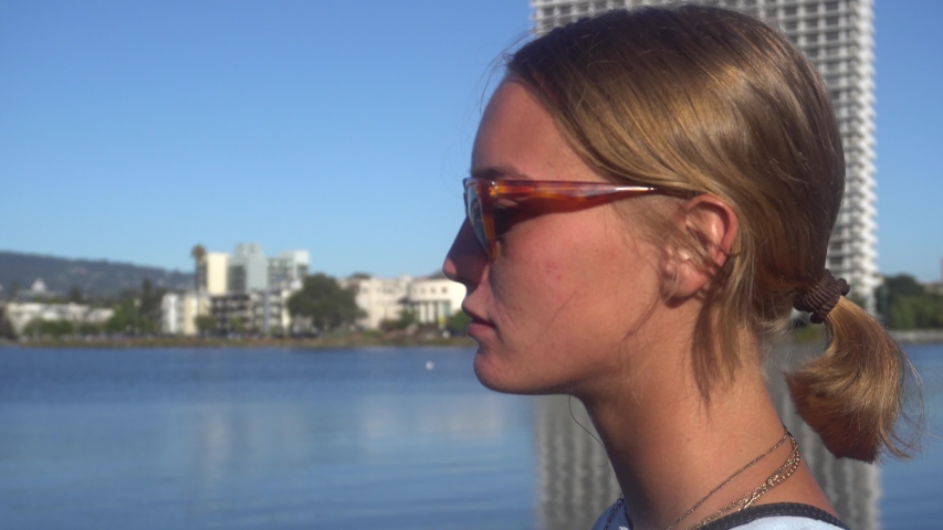 Woman Watching Lake Merritt in Oakland, Close Up