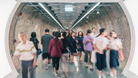 Bangkok, Thailand - September 26 2019 : Crowd people walking inside MRT tunnel underground passageway at Samyan Mitrtown Urban Life in Bangkok on September 26, 2019, Thailand.