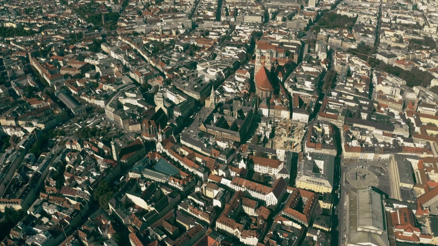 High altitude aerial shot of Munich involving famous Max-Joseph-Platz square and Frauenkirche church, Germany Royalty-Free Stock Footage #1037916440